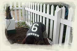 Placencia kids get to work making their Park lush and green